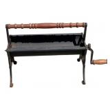 Vintage Cast Iron Newspaper Log Roller
