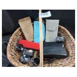 Basket of glasses cases and necklace