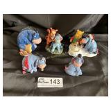 5- Eeyour figurines - 1 with broken snow globe