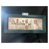 Framed picture of birdhouses