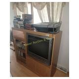 Entertainment center, TV and VCR tapes