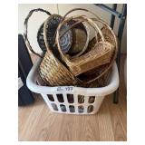 Laundry basket full of woven baskets