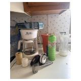 Mr. Coffee coffee maker, exam gloves, meat tendere