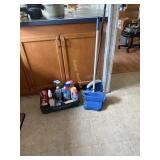 Box of cleaning supplies, broom dustpan