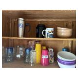 Contents of upper cabinets to right of sink.