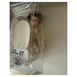 Small porcelain doll approx 6-8'  with cloth body