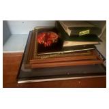 Contents of bottom shelf; Picture frames photo alb