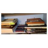 Contents on 2nd shelf, photo frames and Smokies