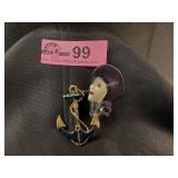 Lot of 2 fashion pins, one gold tone