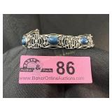 Vintage silver bracelet with scrollwork panels set