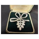 Vintage silver-tone brooch with clear rhinestones