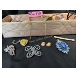 Lot of misc rhinestone pins, sweater cuffs