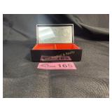Small black enameled jewlery box