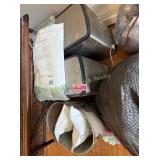 Bag of blankets, 2 small trash cans, 3 bags of