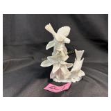 Unmarked vintage white porcelain figure features