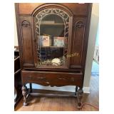 Jacobean Revival style arched china cabinet
