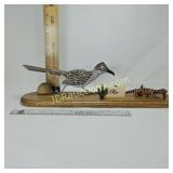 ROAD RUNNER CHASING A LIZARD