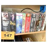 SHELF OF VHS TAPES