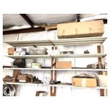 CAR PARTS ON WALL SHELF UNIT