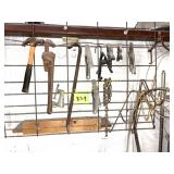 TOOLS ON WALL, HAMMPER, PIPE WRENCH, CLAMPS