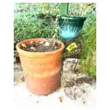 LG TERRA COTTA AND SM PLASTIC PLANTERS