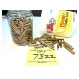 JAR OF 22 HORNET AND HANDFUL 223 AND 357 BULLETS