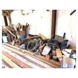 WOOD AND SCRAP PILE IN CENTER GARAGE