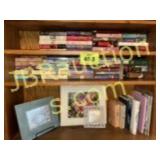 SHELVES W BOOKS AND PICTURES