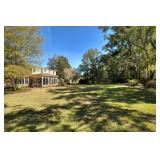 Angle view of rear of home, back yard