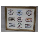 framed group of fishing patches >