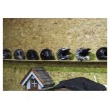 assorted helmets