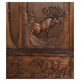 with carved Moose on door >