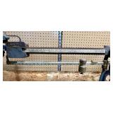 Close up of slide weight;