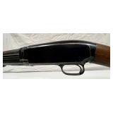  slide action shotgun>