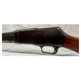 slide-action shotgun>