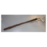 wooden staff with >
