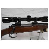 with Tasco 3x9-40 scope >