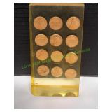 (12) 1971 Shiny Pennies Acrylic Paperweight