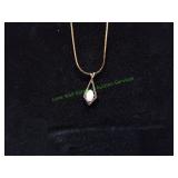 Kite Shaped Pendant w/ White Stone