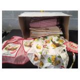 Box of Kitchen Linens to Include Aprons & More