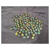 1lb of Cat Eye Marbles in Crown Royal Bag