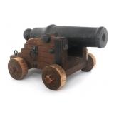 IRON SIGNAL CANNON ON WOODEN CARRIAGE