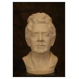 The self portrait sculpture measures 16.5"  tall