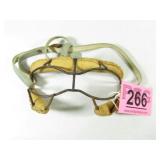 An early piece of baseball safety equipment   whic