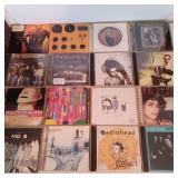 CDs tragically hip Radiohead The Sonics Pj Harvey
