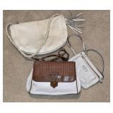 Group of White Leather Purses