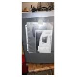 Large paper shreader. Has book.