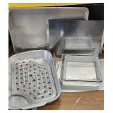 Set of baking dishes. 3 sheets, one roast pan, 2
