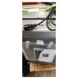 Large paper shreader. Has book.