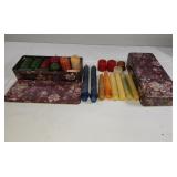 2 -Tins of 24 vintage candles & candle Sticks